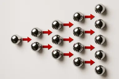 Une illustration de billes se dupliquant à travers des flèches.